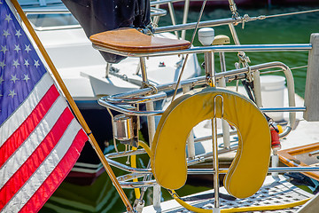 Image showing boat captains seat with american flag