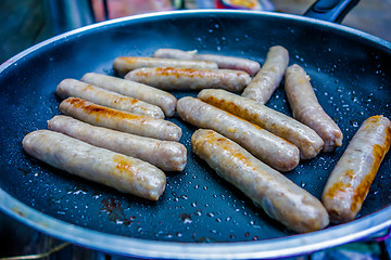 Image showing cooking breakfast on a camping stove