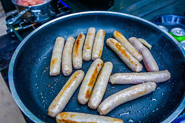 Image showing cooking breakfast on a camping stove