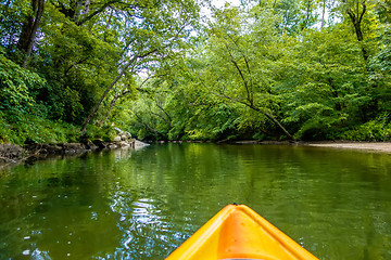 Image showing view from kayak towards mountain river rushing waters