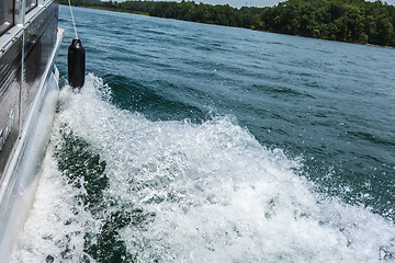 Image showing Waves on lake behind the speed boat  