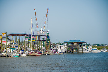 Image showing boats and fishing boats in the harbor marina