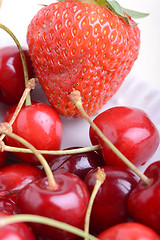 Image showing Background from fresh ripe strawberries and cherry