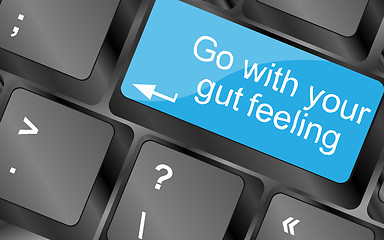 Image showing Go with your gut feeling. Computer keyboard keys with quote button. Inspirational motivational quote. Simple trendy design