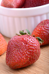 Image showing Strawberry set on wooden plate close up