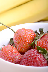 Image showing strawberries and bananas close up, health food concept