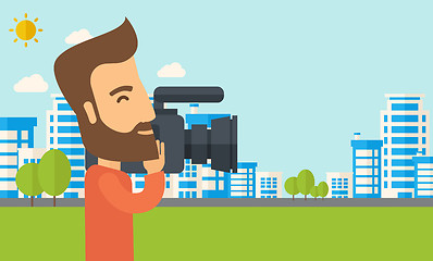 Image showing Cameraman with video camera