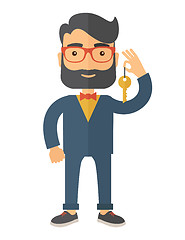 Image showing Business man holding a Golden key.