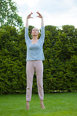 Image showing beautiful woman doing yoga