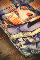 Image showing bright shirts in a pile