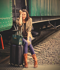 Image showing beautiful woman traveler laughing