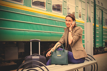 Image showing beautiful woman talking on a cell