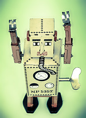 Image showing robot toy surrender