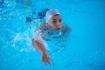 Image showing child on swimming poo