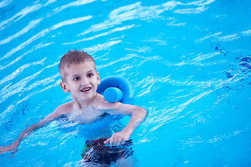 Image showing child on swimming poo