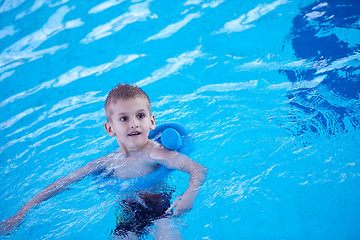 Image showing child on swimming poo