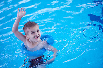 Image showing child on swimming poo