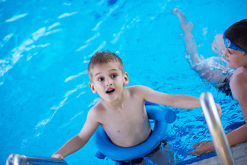 Image showing child on swimming poo