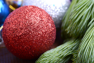 Image showing Decorated christmas tree - holiday background, green tree eve branch close up with christmas balls 