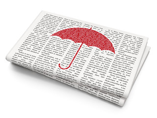 Image showing Security concept: Umbrella on Newspaper background