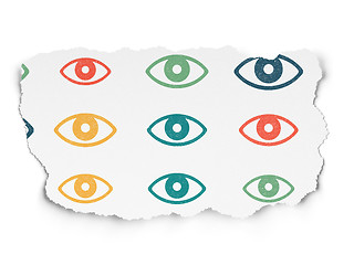 Image showing Security concept: Eye icons on Torn Paper background