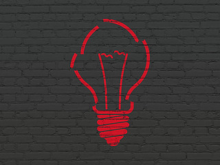 Image showing Business concept: Light Bulb on wall background