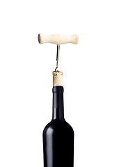 Image showing Opening bottle of wine