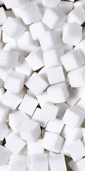 Image showing white sugar in cubes texture background