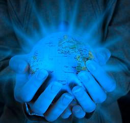 Image showing Globe in a girl's hands