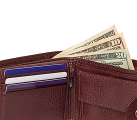 Image showing close up of brown leather wallet with money