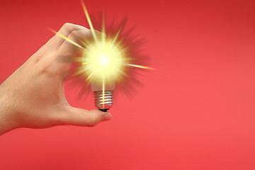 Image showing Background with lit lightbulb