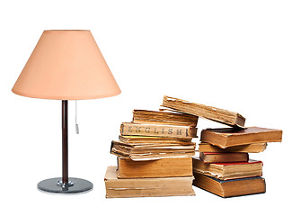 Image showing old books with a lamp