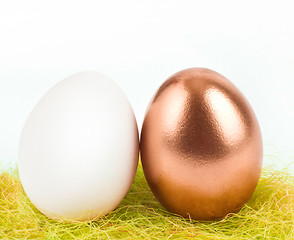 Image showing gold egg with white