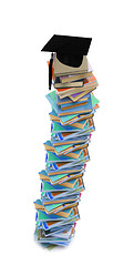 Image showing Student hat on books