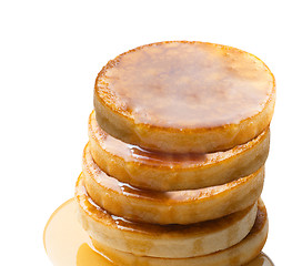 Image showing stack of pancakes with syrup