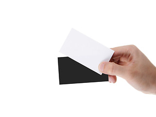 Image showing hand holding blank and black business card