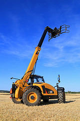 Image showing Cat TH407C Telescopic Handler on Stubble Field