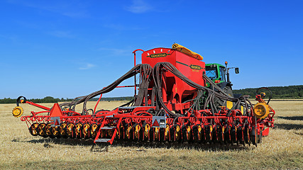 Image showing Vaderstad Spirit 600C Seed Drill and John Deere 7340 Tractor