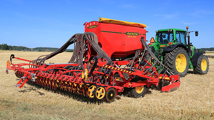 Image showing Vaderstad Spirit 600C Seed Drill and John Deere 7340 Tractor