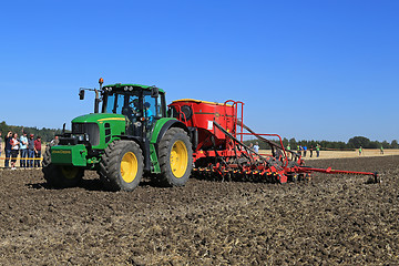 Image showing John Deere 7430 Tractor and Vaderstad Spirit 600C Seed Drill on 