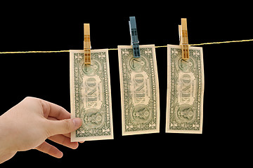 Image showing Dollars on the wire