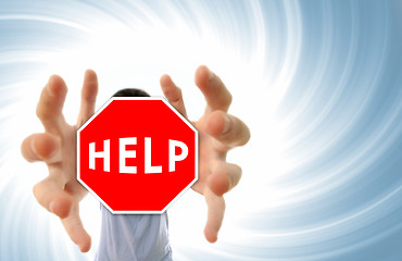 Image showing Man grabing a help sign.