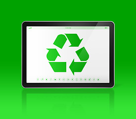 Image showing Digital tablet PC with a recycling symbol on screen. ecological 