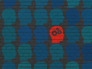 Image showing Education concept: head with gears icon on wall background