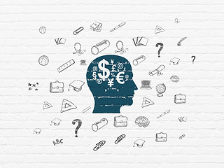 Image showing Education concept: Head With Finance Symbol on wall background