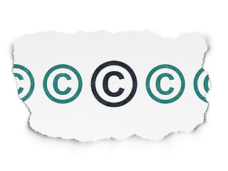 Image showing Law concept: copyright icon on Torn Paper background