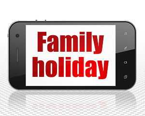 Image showing Vacation concept: Smartphone with Family Holiday on display