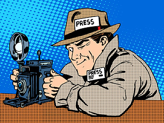 Image showing Photographer paparazzi at work press media camera. The reporter 