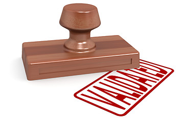 Image showing Wooden stamp validated with red text