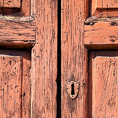 Image showing door    in italy old ancian wood and traditional  texture nail